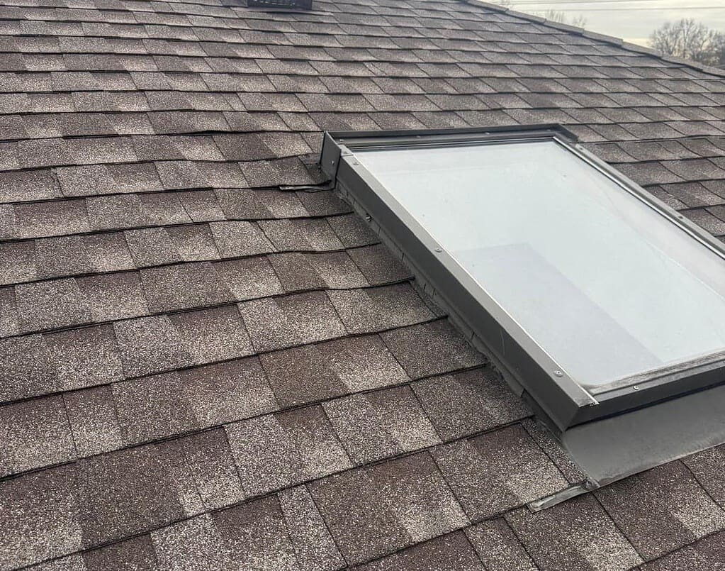 Skylight installed in a new asphalt shingle roof on a New Jersey home